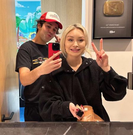 David Dobrik and Taylor Hudson took a mirror selfie.